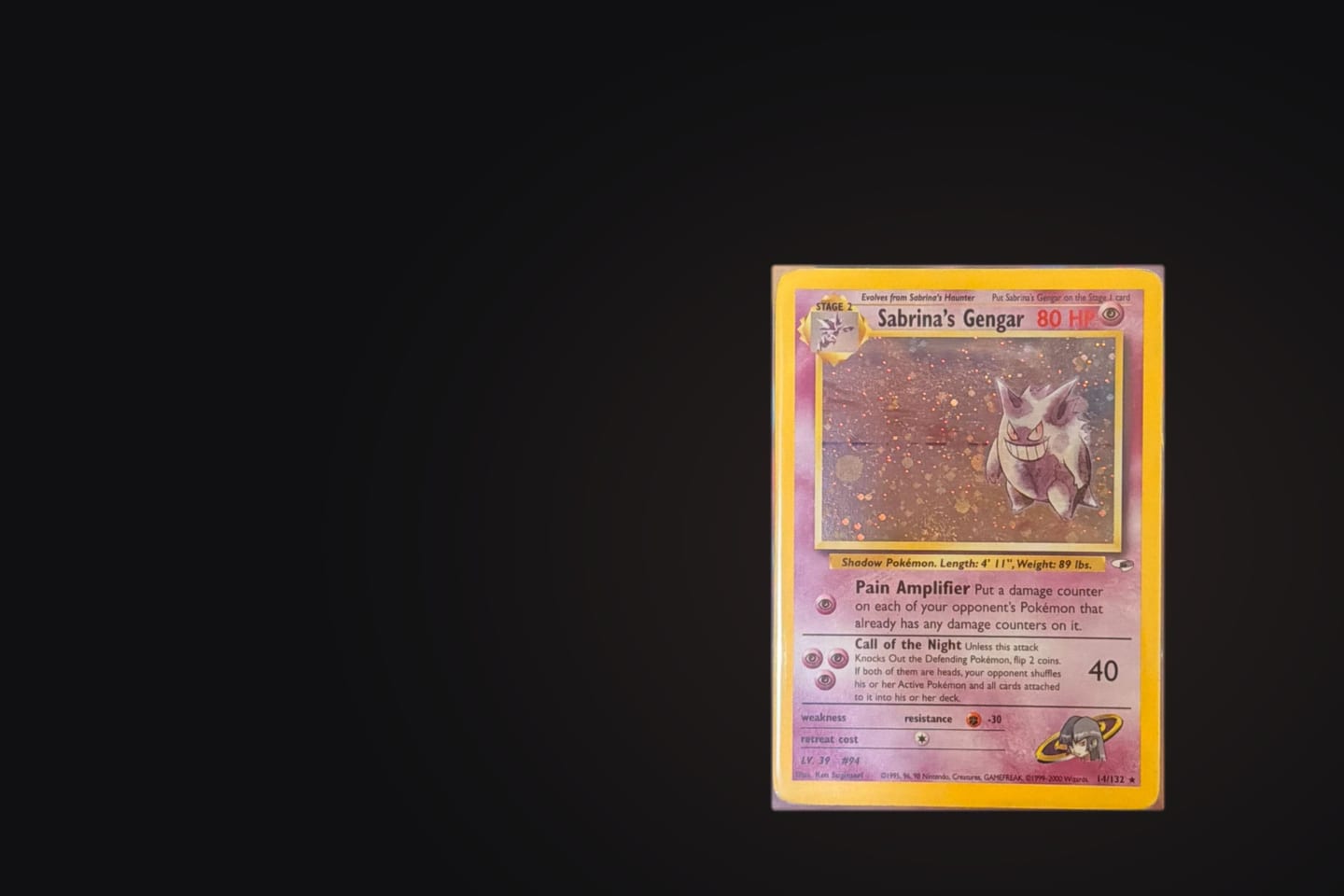 Sabrina’s Gengar, a holographic Pokémon card with a yellow border, in a clear toploader against a dark background.